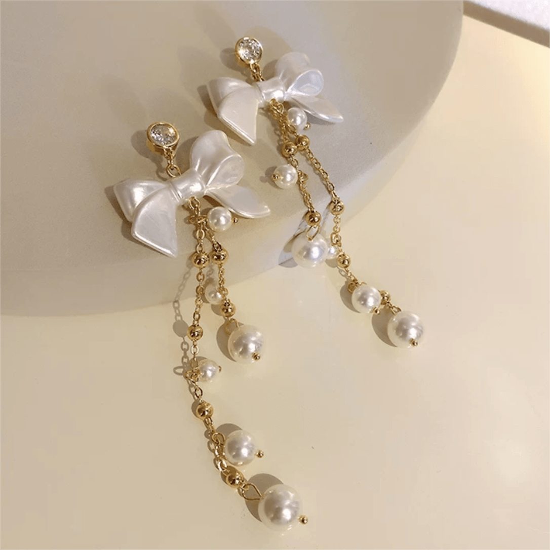 Dainty Rhinestone Inlaid Dangling Bowknot Pearl Earrings