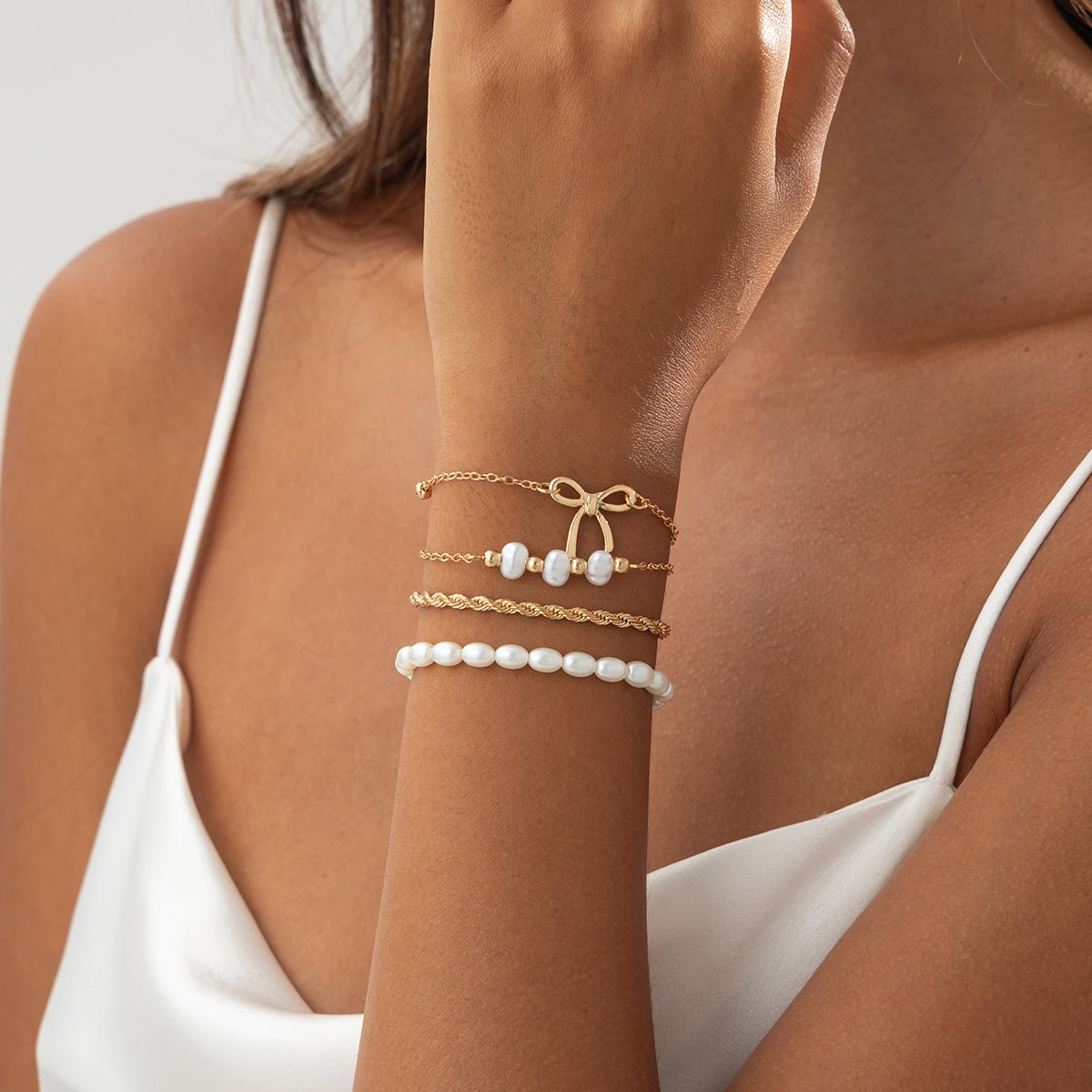 Elegant 4pcs Bowknot Charm Pearl Rope Chain Bracelet Set - ArtGalleryZen