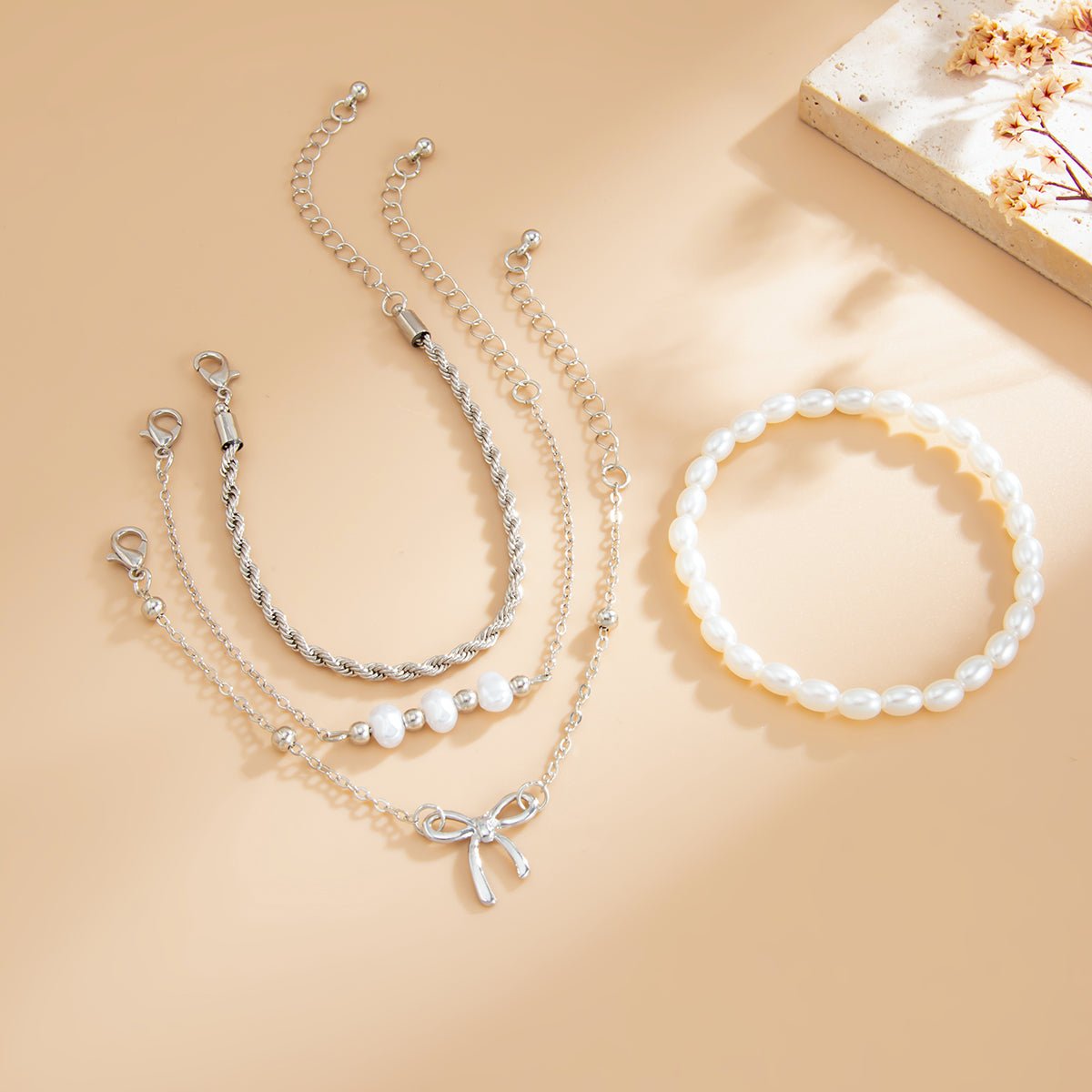 Elegant 4pcs Bowknot Charm Pearl Rope Chain Bracelet Set - ArtGalleryZen