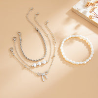 Thumbnail for Elegant 4pcs Bowknot Charm Pearl Rope Chain Bracelet Set - ArtGalleryZen
