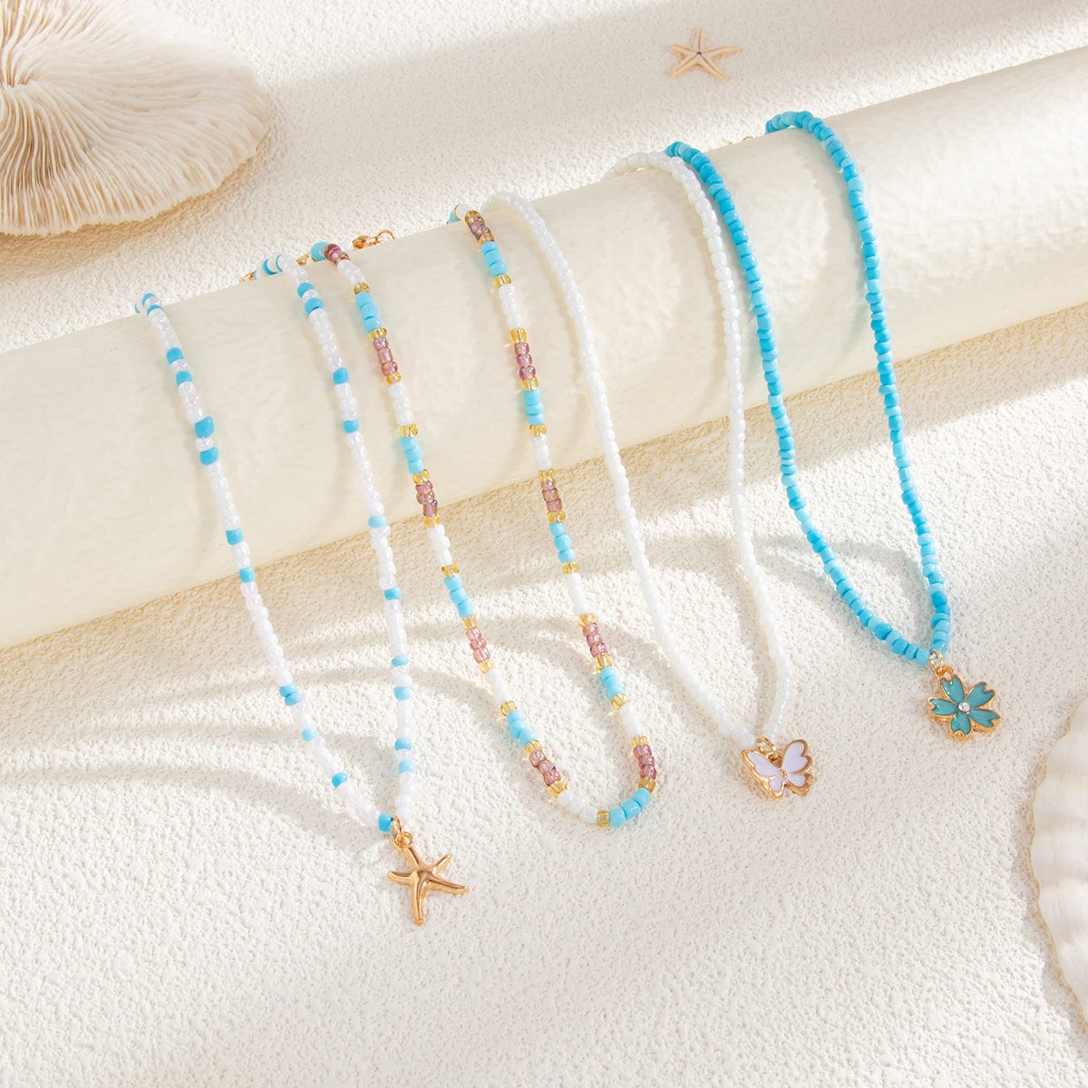 Elegant 4pcs Enamel Butterfly Flower Starfish Pendant Seed Beaded Necklace Set - ArtGalleryZen