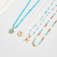 Thumbnail for Elegant 4pcs Enamel Butterfly Flower Starfish Pendant Seed Beaded Necklace Set - ArtGalleryZen