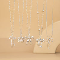 Thumbnail for Elegant 5pcs Bowknot Charm Saturn Chain Necklace Set - ArtGalleryZen