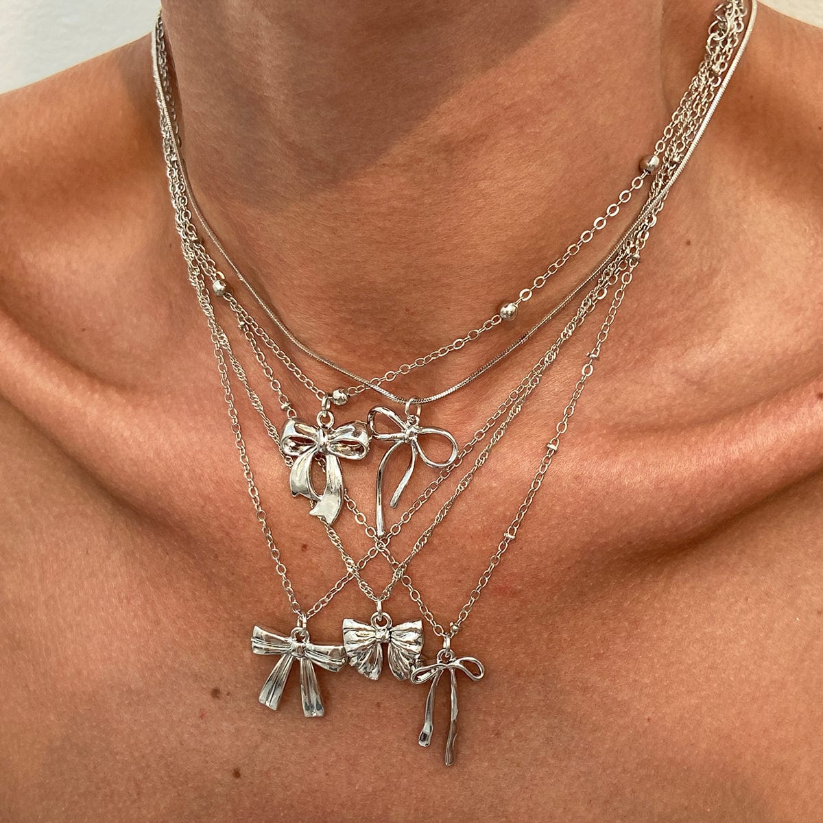 Elegant 5pcs Bowknot Charm Saturn Chain Necklace Set - ArtGalleryZen