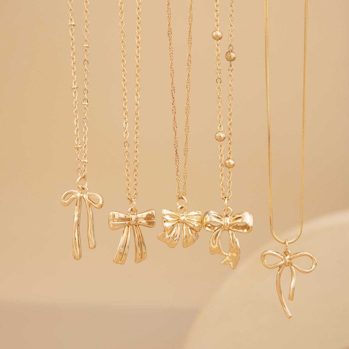 Elegant 5pcs Bowknot Charm Saturn Chain Necklace Set - ArtGalleryZen