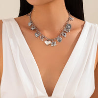 Thumbnail for Elegant Gold Silver Tone Relief Heart Bowknot Tassel Necklace - ArtGalleryZen