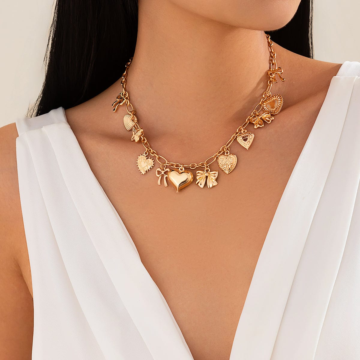 Elegant Gold Silver Tone Relief Heart Bowknot Tassel Necklace - ArtGalleryZen