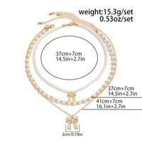 Thumbnail for Elegant Layered Enamel Bowknot Pendant Pearl Chain Necklace Set - ArtGalleryZen