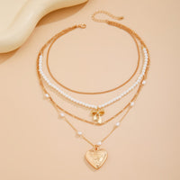 Thumbnail for Elegant Layered Floral Heart Bowknot Pendant Pearl Chain Necklace