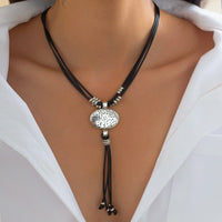 Thumbnail for Ethnic style Layered Carved Oval Charm PU string Tassel Necklace