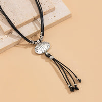 Thumbnail for Ethnic style Layered Carved Oval Charm PU string Tassel Necklace