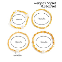 Thumbnail for Geometric 4pcs Gold Silver Tone Pearl Square Beaded Bracelet Set - ArtGalleryZen