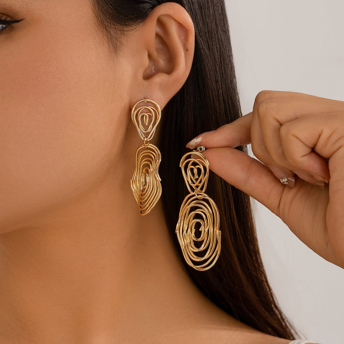 Geometric Dangling Spiral Oval Stud Earrings