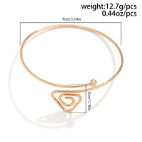 Thumbnail for Geometric Minimalist Spiral Triangle Arm Cuff