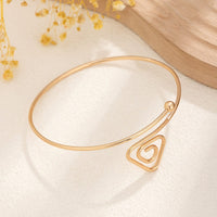 Thumbnail for Geometric Minimalist Spiral Triangle Arm Cuff