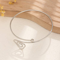 Thumbnail for Geometric Minimalist Spiral Triangle Arm Cuff