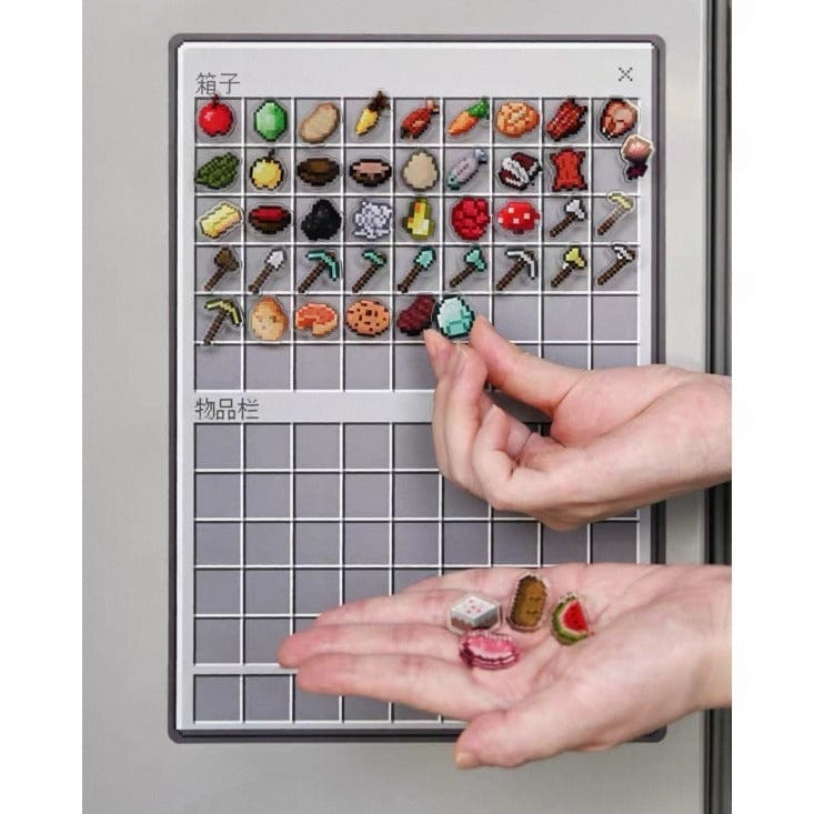 Hand holding small pixelated items in front of a grid display with similar items.