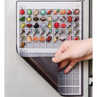 Thumbnail for Hand holding a silicone mold with pixelated food and tool designs on a white background