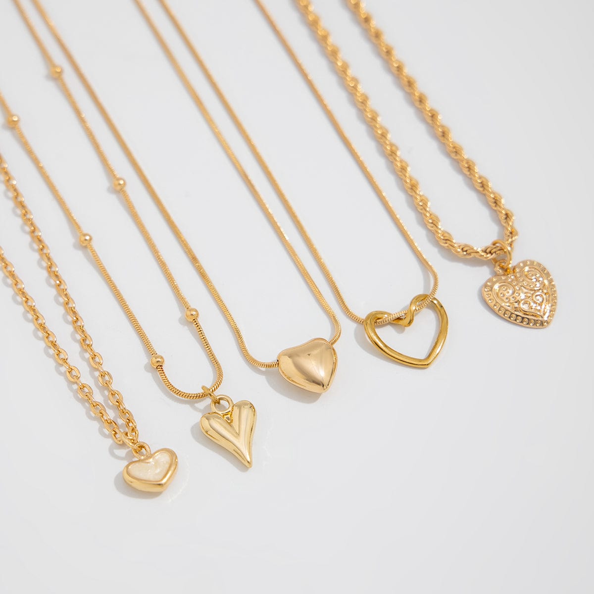Minimalist 5pcs Relief Hollow Heart Pendant Rope Saturn Chain Necklace Set - ArtGalleryZen