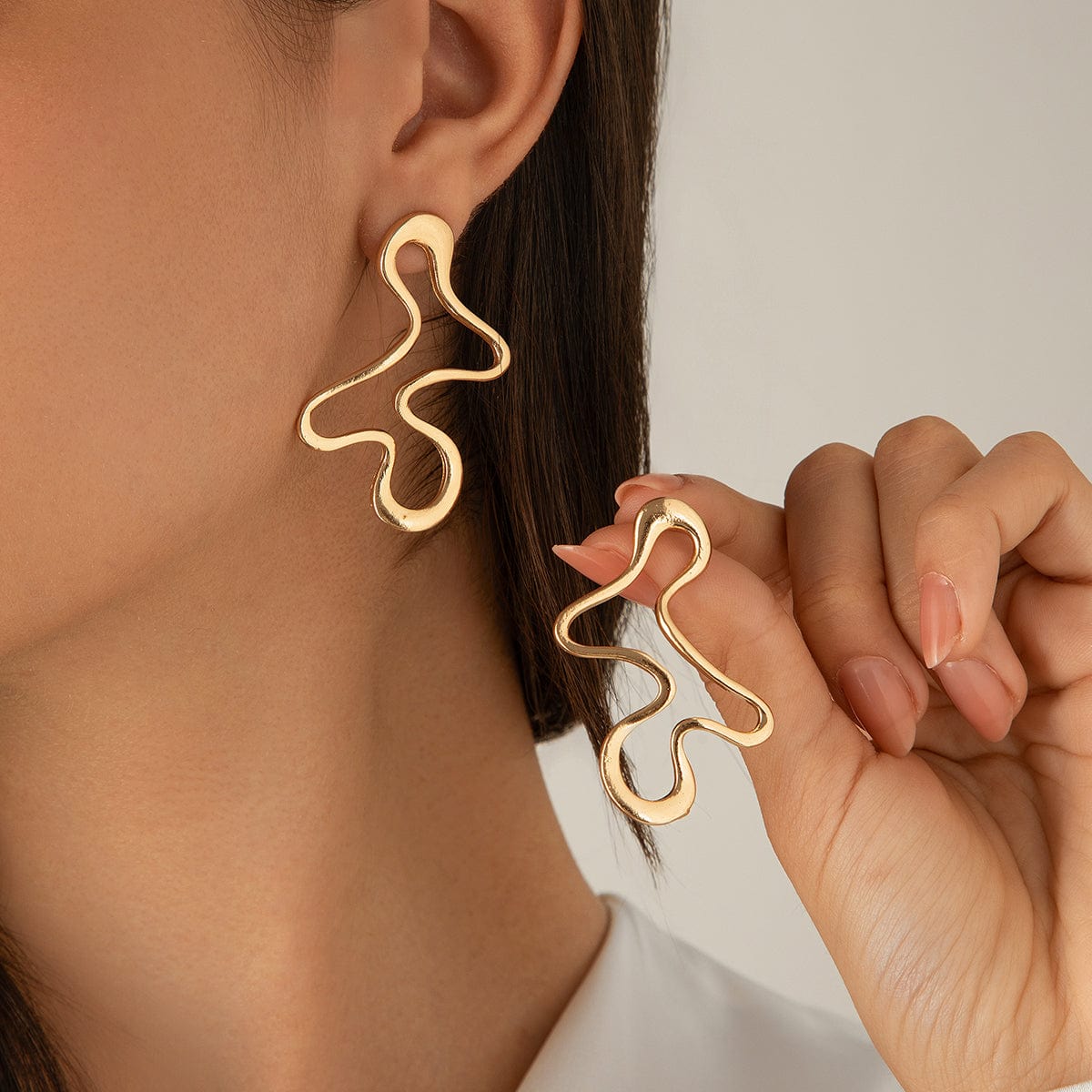 Minimalist Irregular Hollow Pattern Stud Earrings