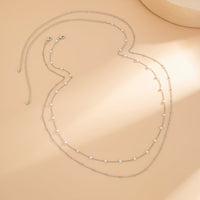Thumbnail for Minimalist Layered Pearl Saturn Waist Chain Set - ArtGalleryZen