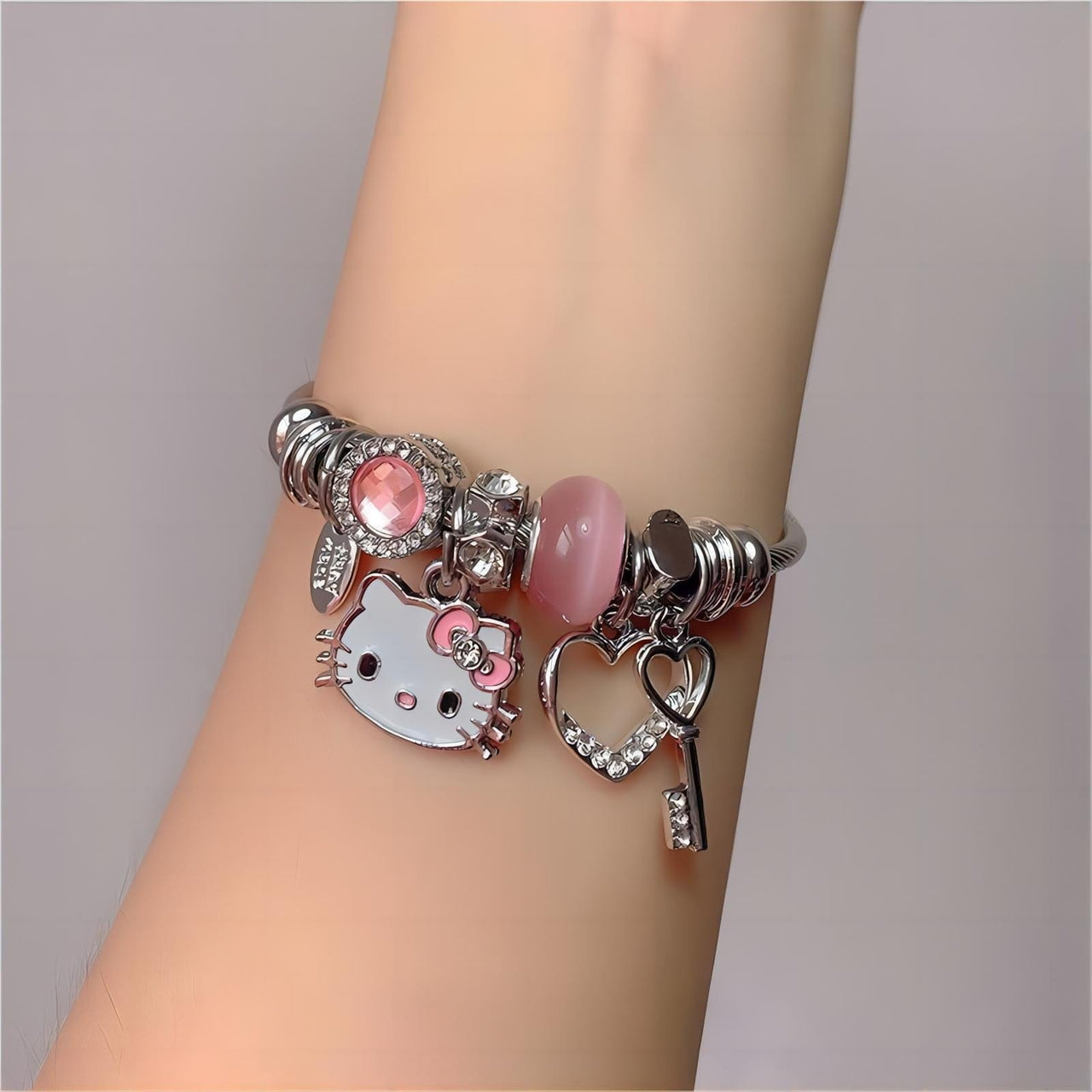 Sanrio CZ Inlaid Stainless Steel Hello Kitty Bangle Bracelet - ArtGalleryZen