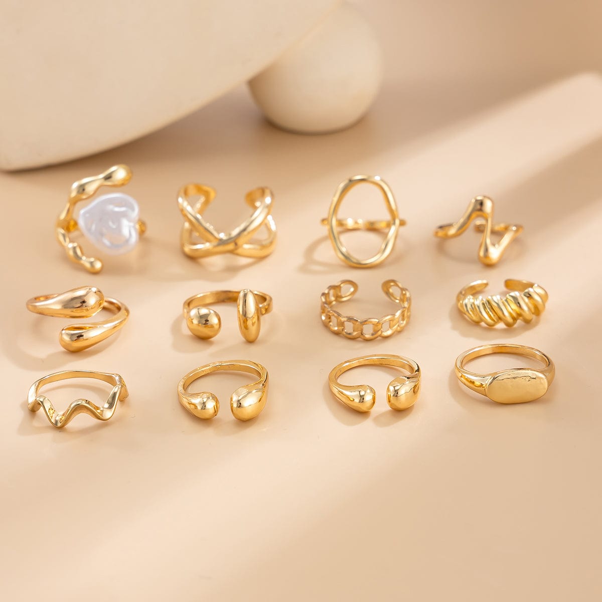 Stylish 12pcs Irregular Pearl Waterdrop Hollow Curved Ring Set - ArtGalleryZen