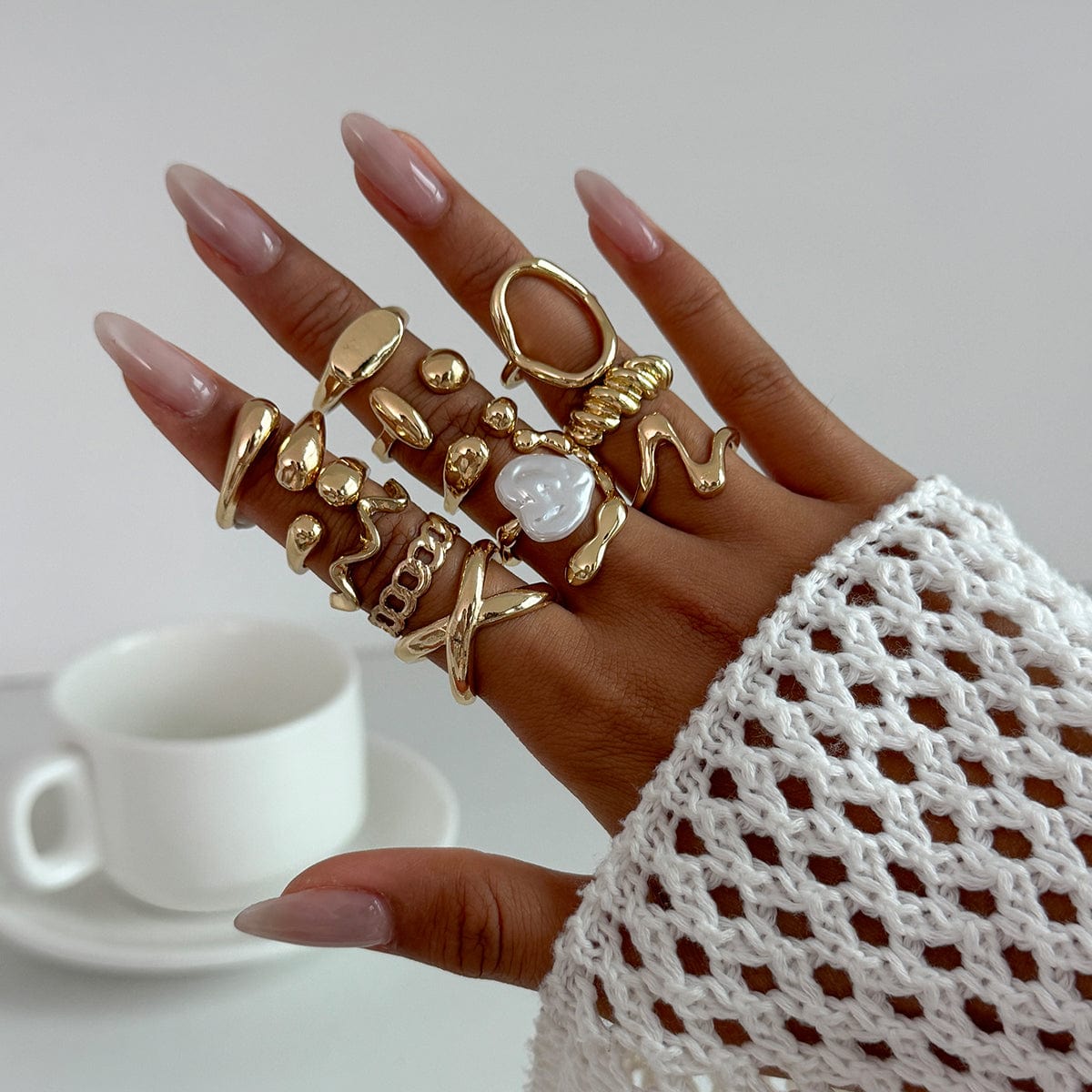 Stylish 12pcs Irregular Pearl Waterdrop Hollow Curved Ring Set - ArtGalleryZen