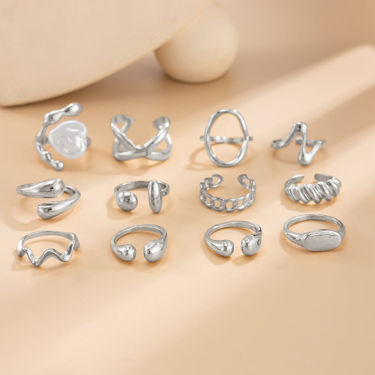 Stylish 12pcs Irregular Pearl Waterdrop Hollow Curved Ring Set - ArtGalleryZen