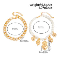Thumbnail for Stylish 2pcs Flame Heart Charm Pearl Chain Anklet Set - ArtGalleryZen