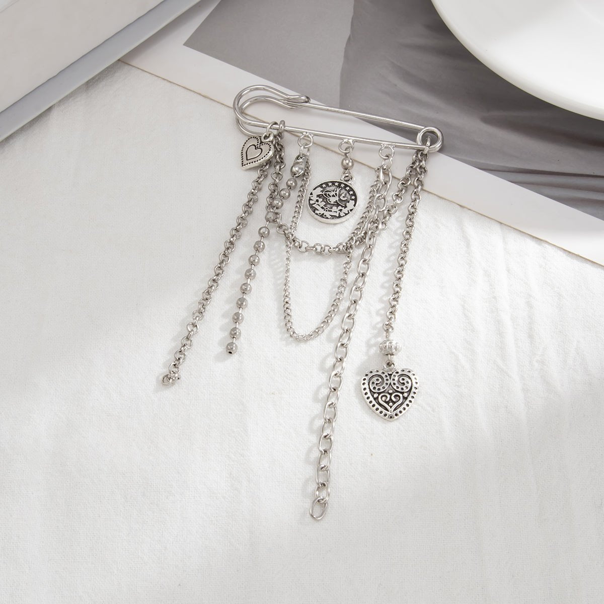 Stylish Carved Round Disk Heart Tassel Trouser Pin - ArtGalleryZen