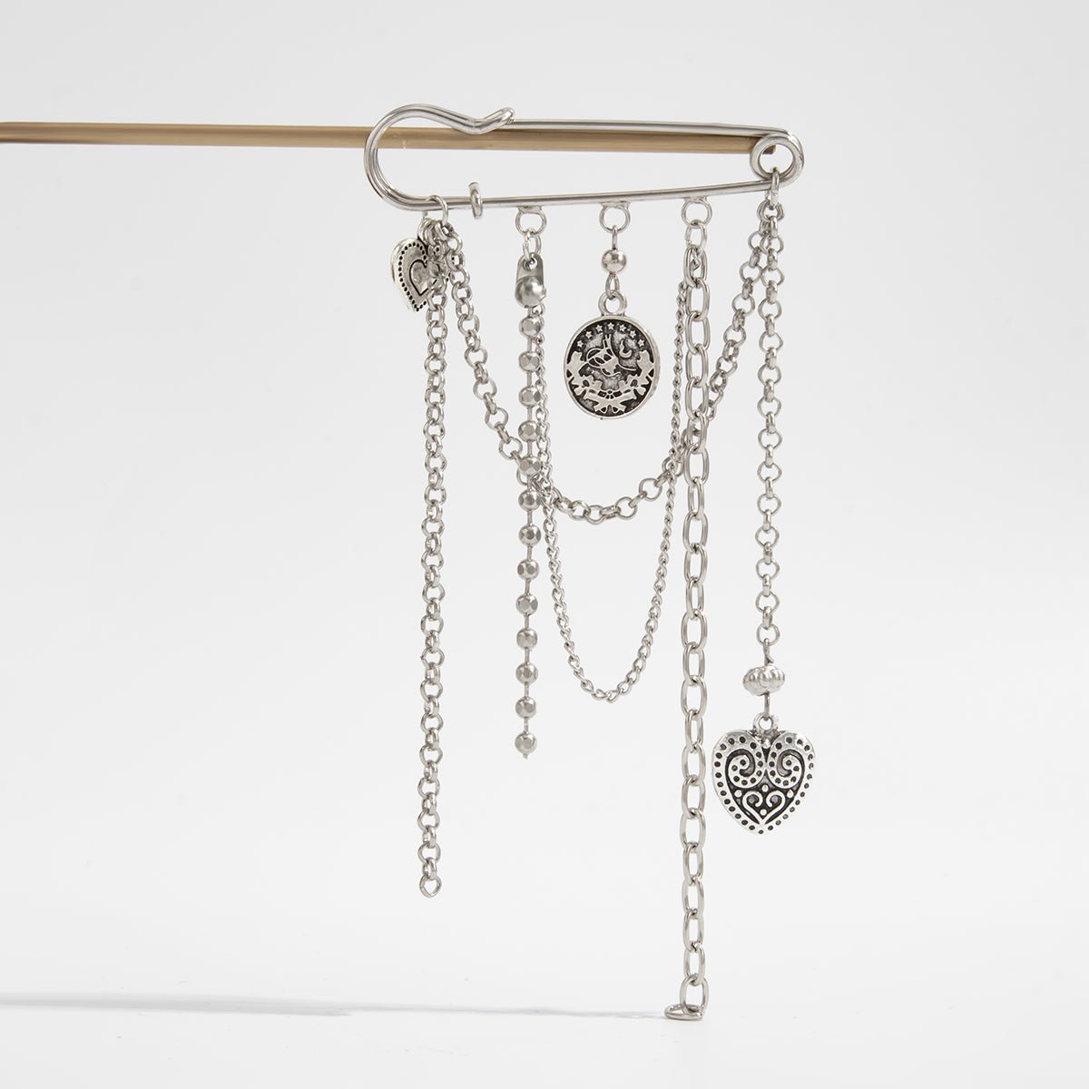 Stylish Carved Round Disk Heart Tassel Trouser Pin - ArtGalleryZen