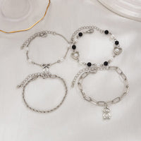 Thumbnail for Stylish Layered Bear Bowknot Charm Pearl Rope Chain Bracelet Set - ArtGalleryZen