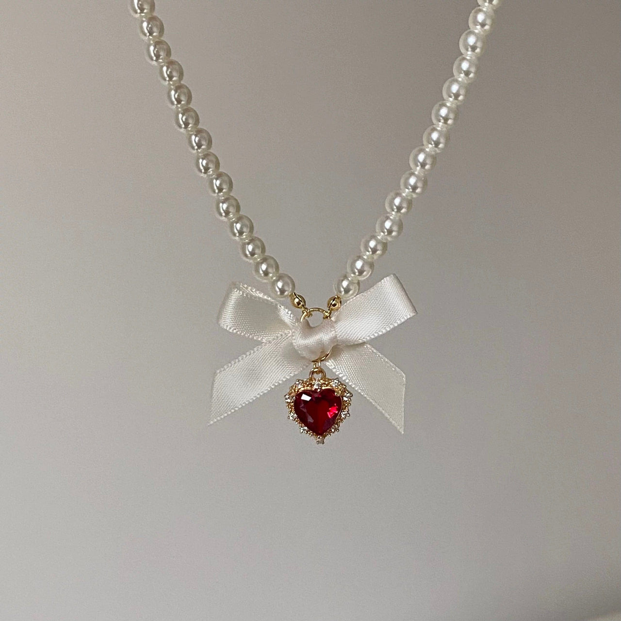 Sweet CZ Inlaid Heart Ribbon Bowknot Pendant Pearl Chain Necklace