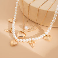 Thumbnail for Trendy 3pcs Bowknot Heart Pendant Pearl Chain Necklace Set - ArtGalleryZen