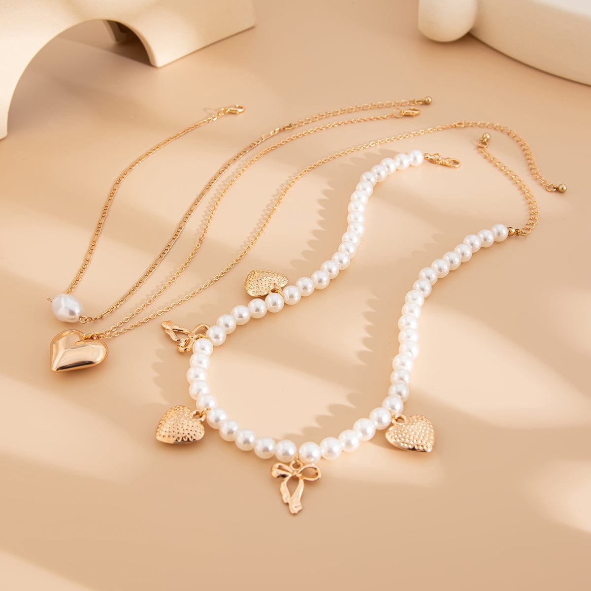 Trendy 3pcs Bowknot Heart Pendant Pearl Chain Necklace Set - ArtGalleryZen