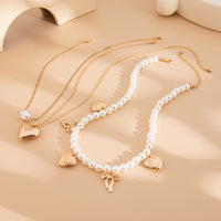 Thumbnail for Trendy 3pcs Bowknot Heart Pendant Pearl Chain Necklace Set - ArtGalleryZen