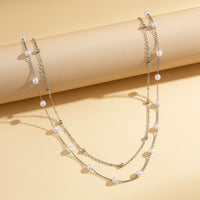 Thumbnail for Trendy Boho Layered Pearl Saturn Belly Chain Set - ArtGalleryZen