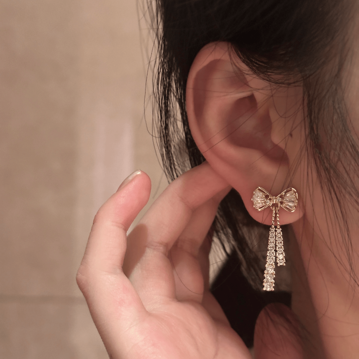 Trendy CZ Inlaid Bowknot Tassel Earrings - ArtGalleryZen