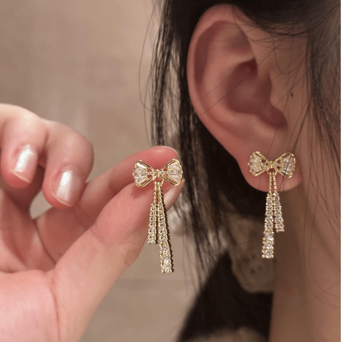 Trendy CZ Inlaid Bowknot Tassel Earrings - ArtGalleryZen