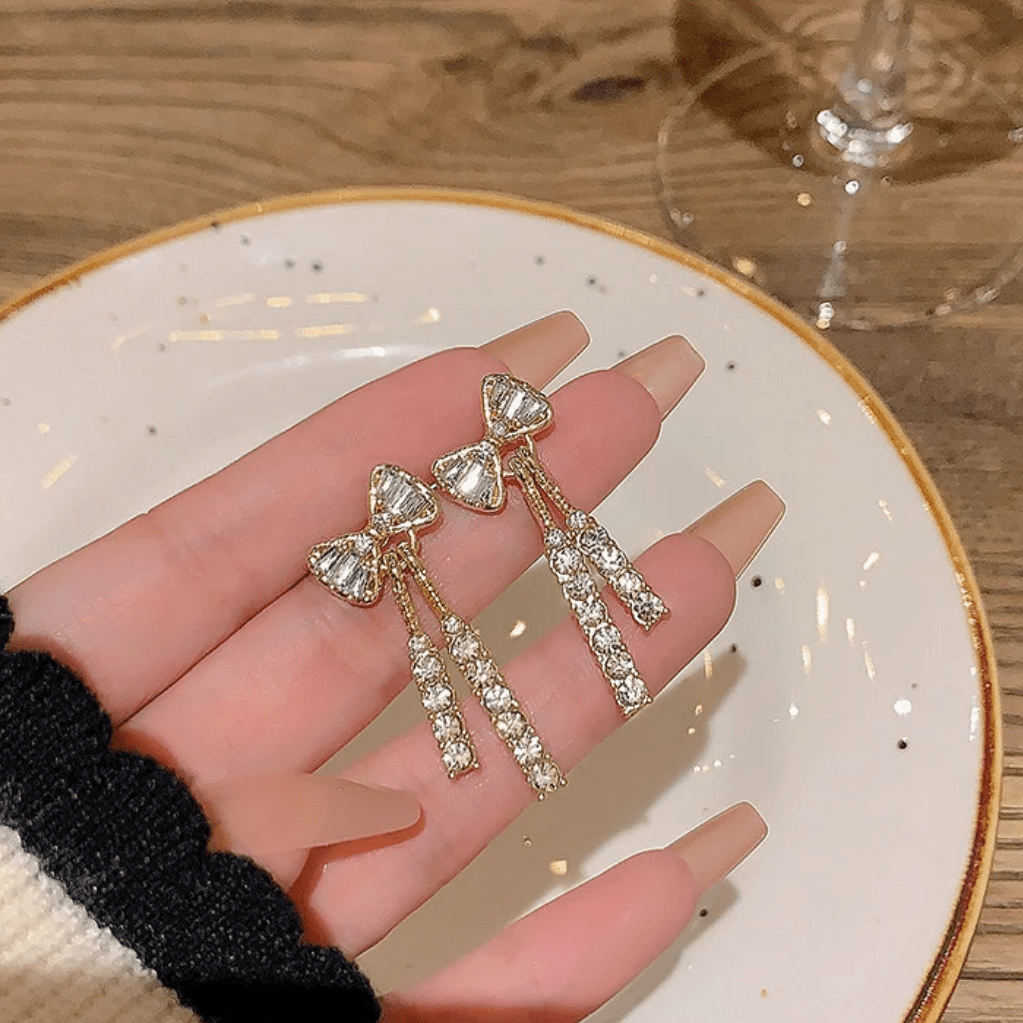 Trendy CZ Inlaid Bowknot Tassel Earrings - ArtGalleryZen