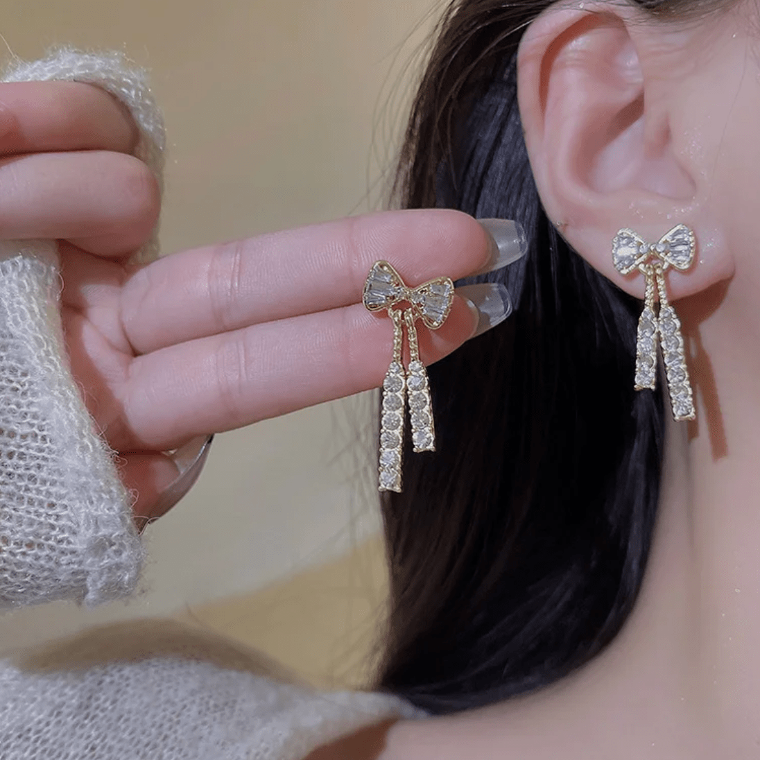 Trendy CZ Inlaid Bowknot Tassel Earrings - ArtGalleryZen