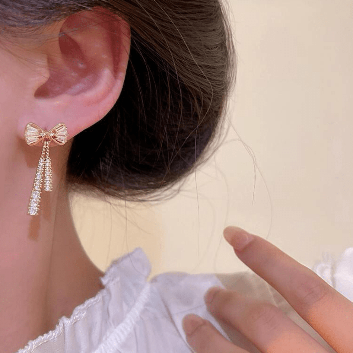 Trendy CZ Inlaid Bowknot Tassel Earrings - ArtGalleryZen