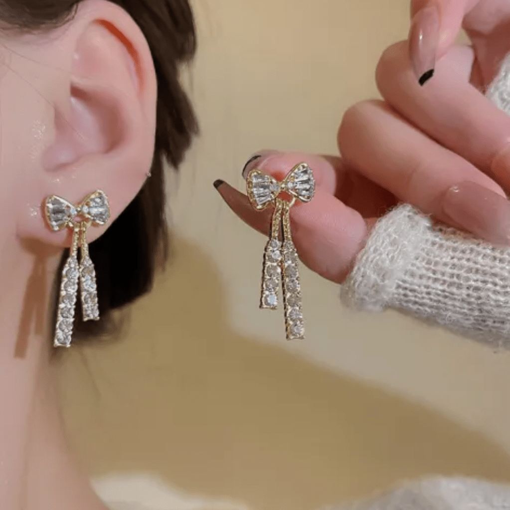 Trendy CZ Inlaid Bowknot Tassel Earrings - ArtGalleryZen