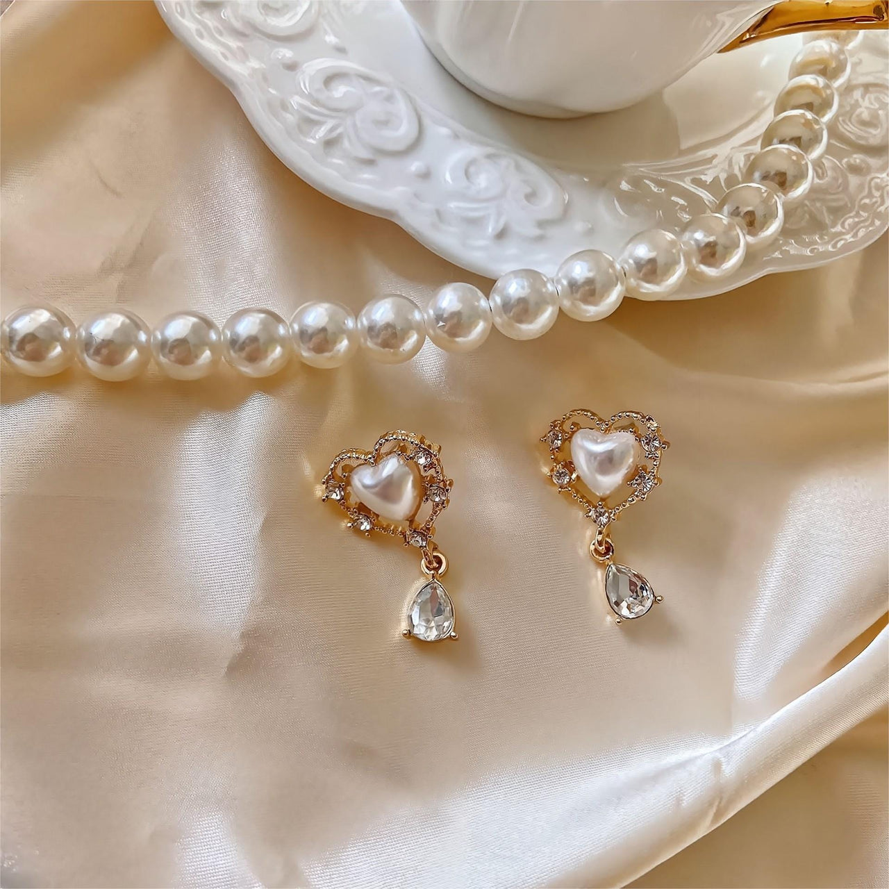 Trendy Dangling Rhinestone CZ Inlaid Pearl Heart Earrings - ArtGalleryZen