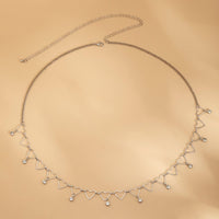 Thumbnail for Trendy Hollow Heart Rhinestone Tassel Belly Chain