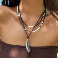 Thumbnail for Trendy Layered Seed Bead Leaf Pendant Velvet Necklace Set - ArtGalleryZen